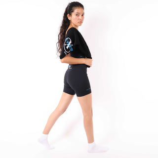 Cyber X Bamboo Small Towel draped over woman's shoulder in fitness setting